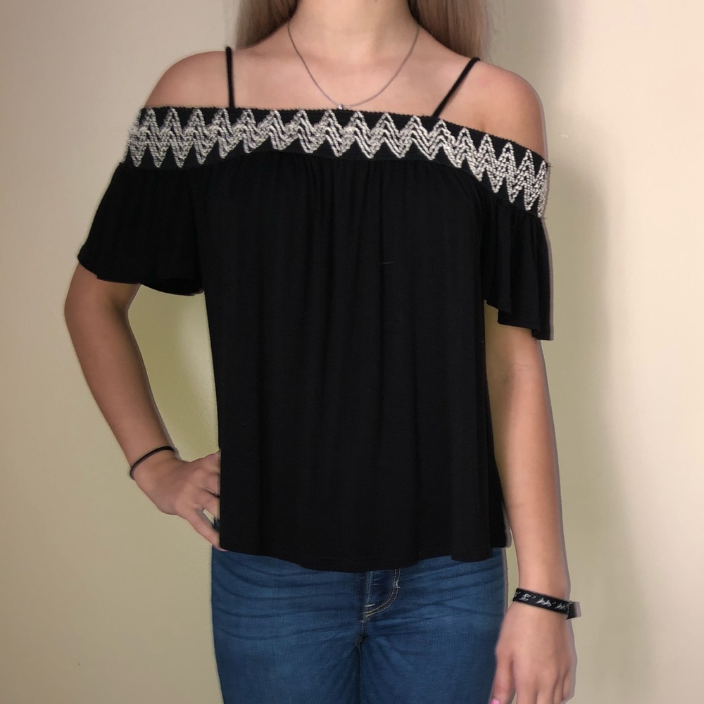 Black shirt with white designs